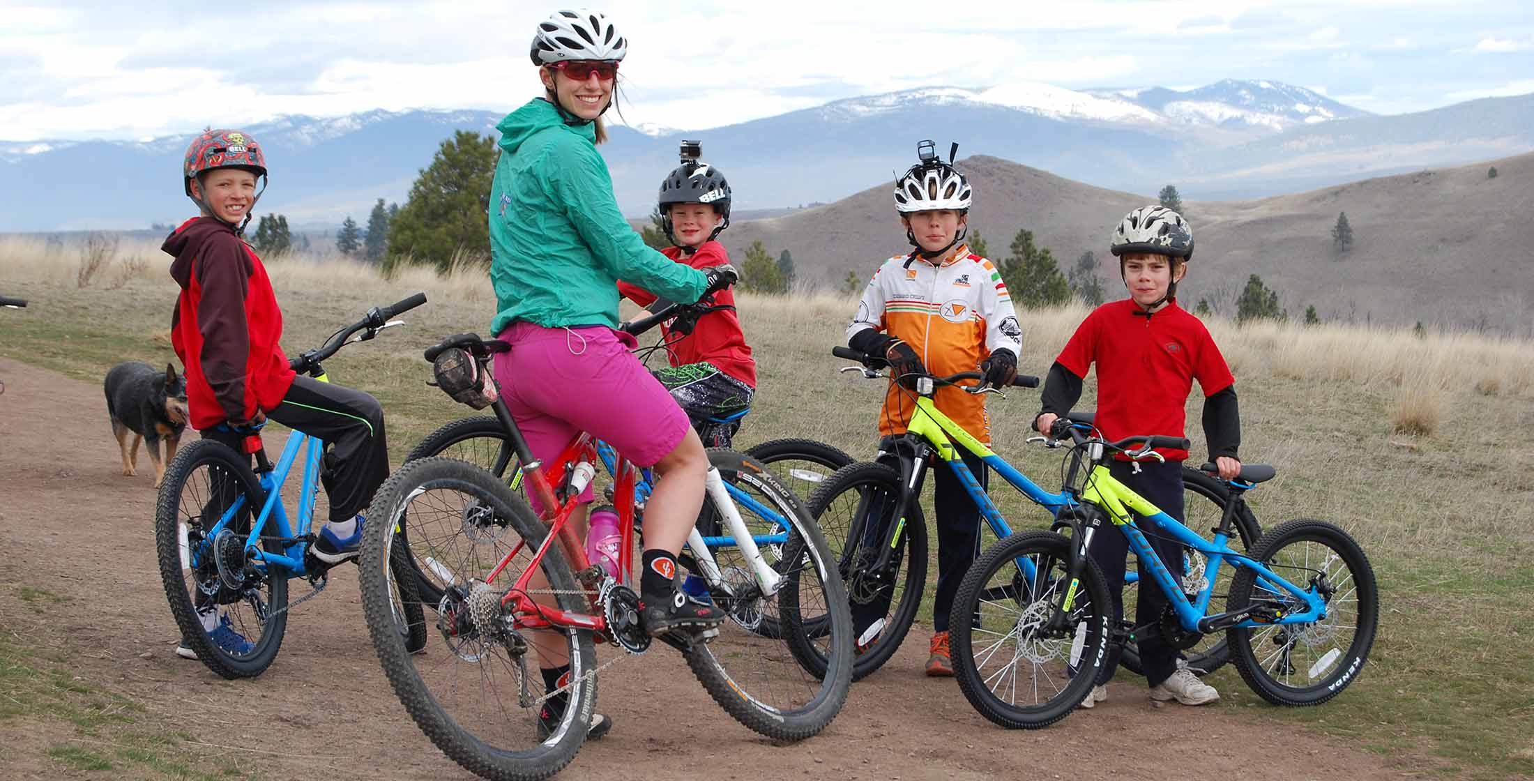 A family cycling on the Bitterroot Trail