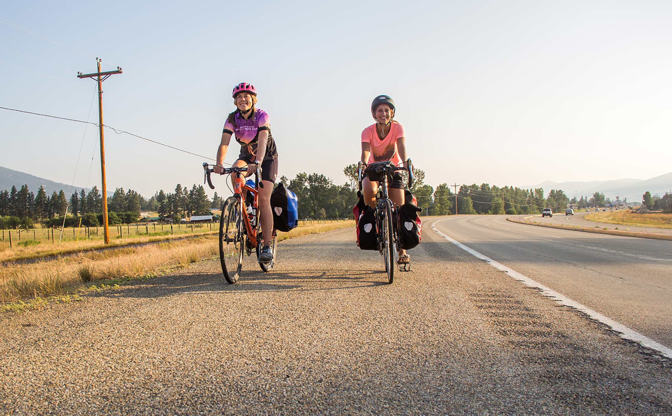 Cyclists posing for a photo while riding on the Bitterroot Trail