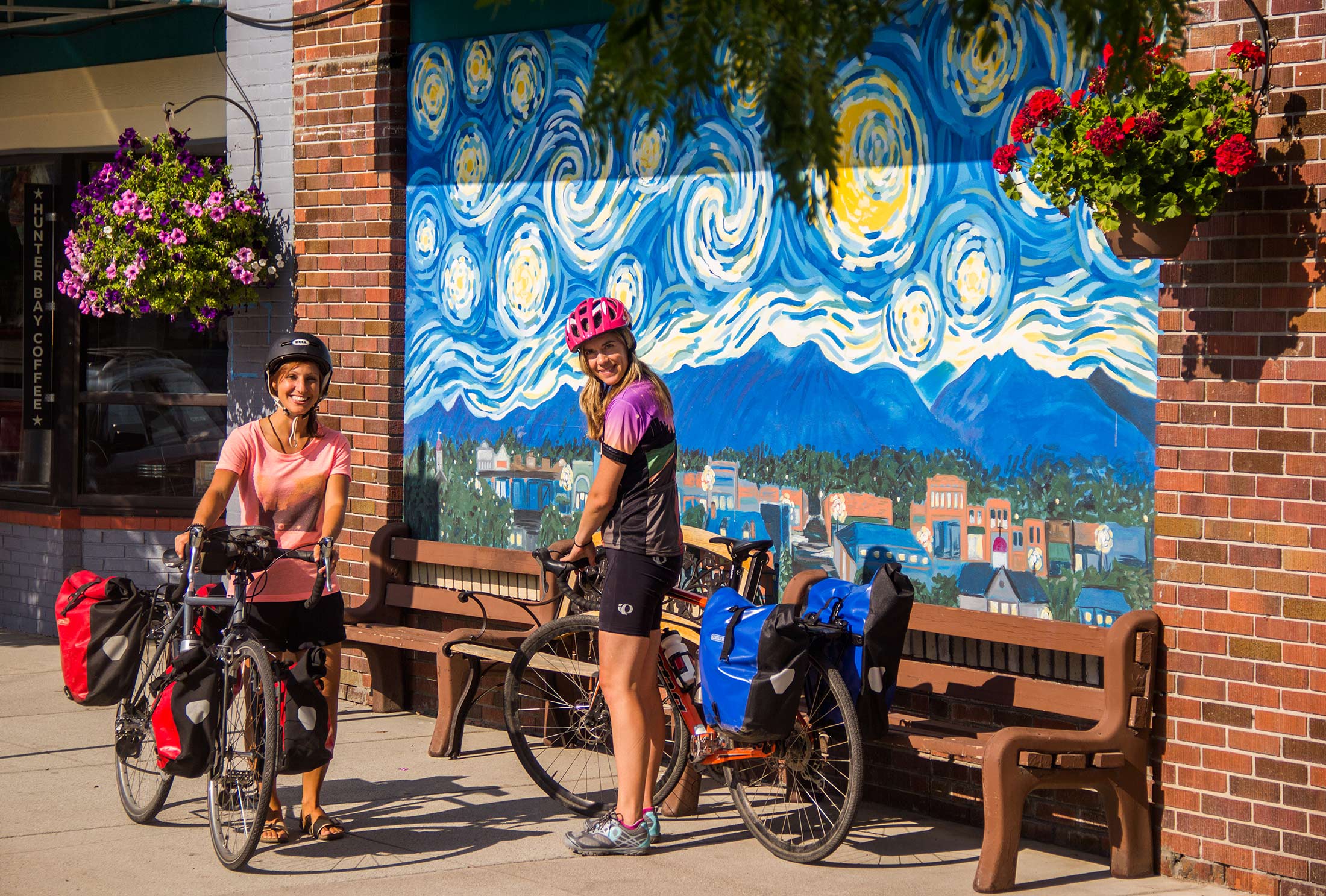 Cyclists take a break to pose for a picture on the Bitterroot Trail